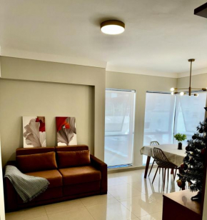 Apartamento no centro com elevador e garagem, perto do mar